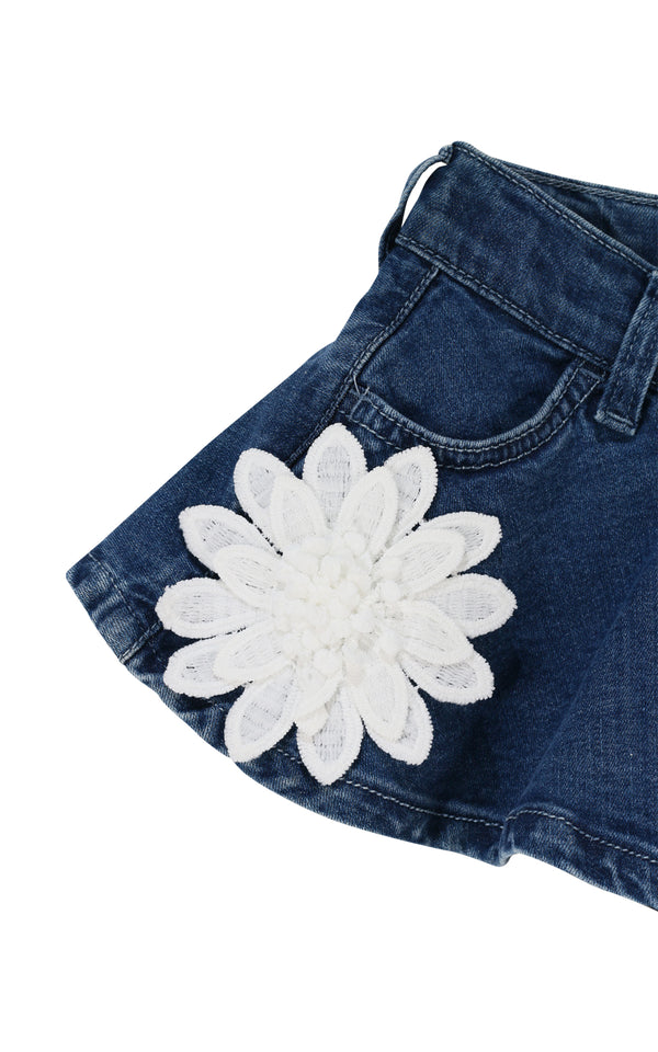 Shorts in denim con applicazioni